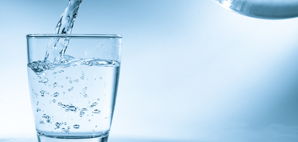 Filling a glass with water